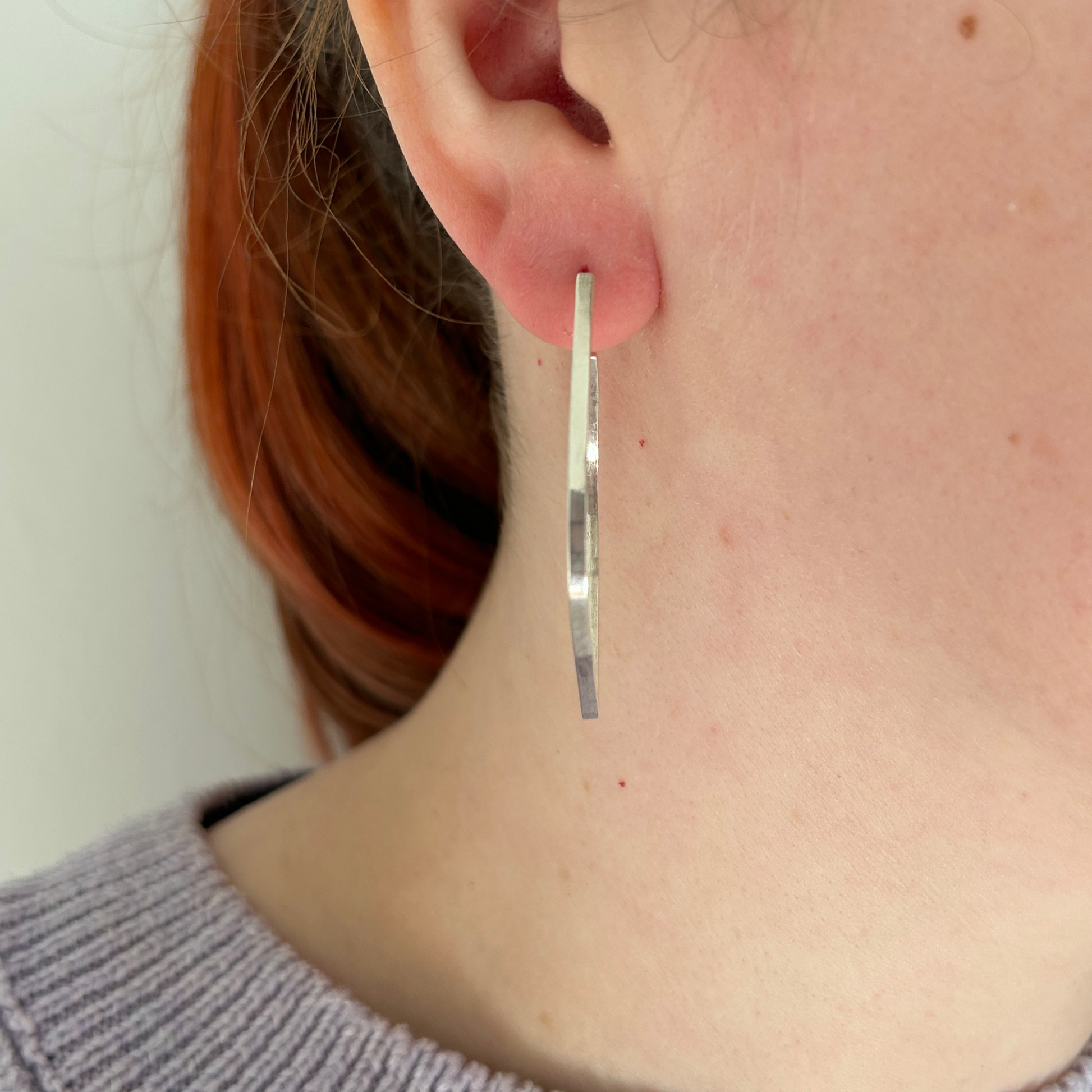 Handmade Sterling Silver Outline Hoop straight on in a Womans ear - By Jen Lithgo Jewellery