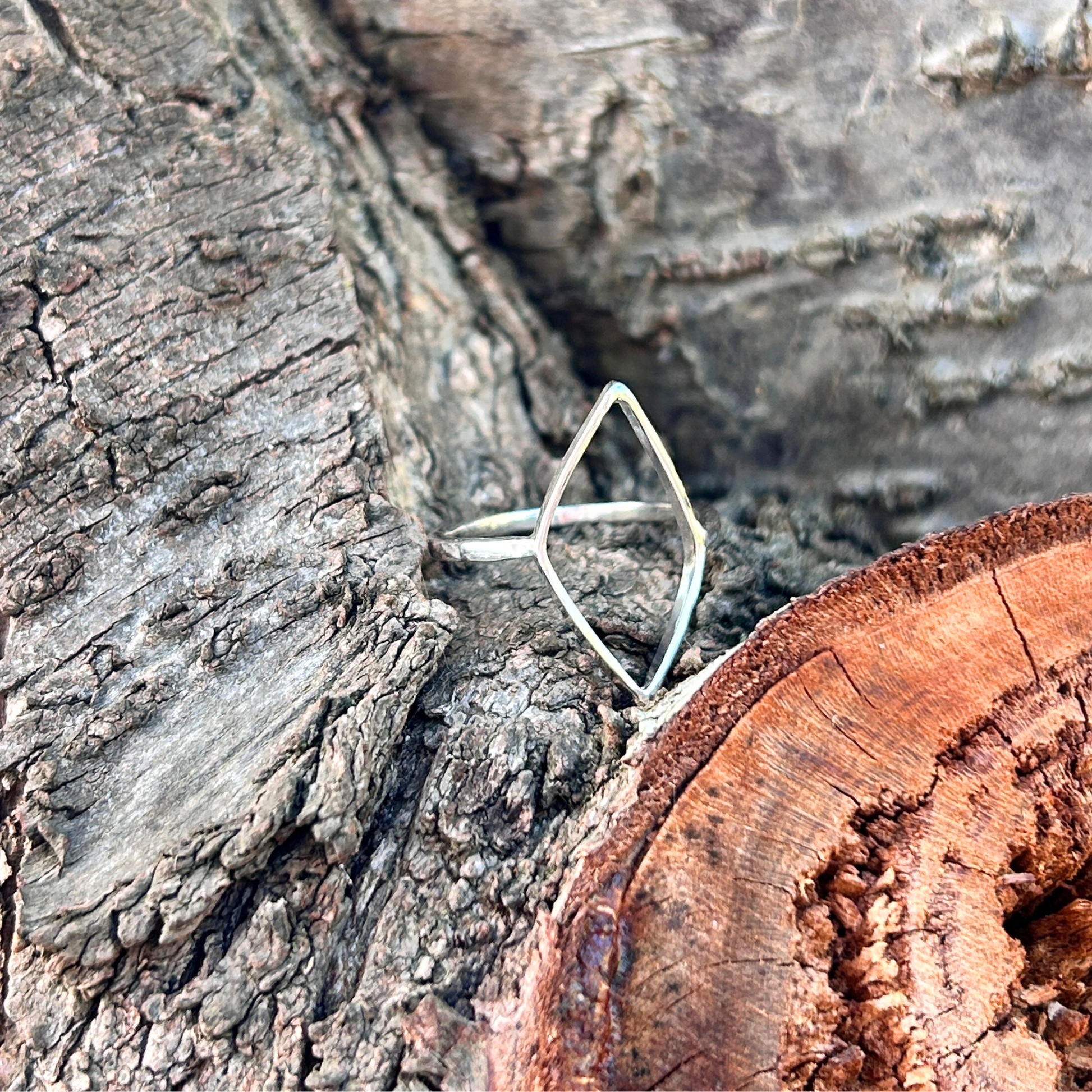 Sterling Silver geometric leaf ring on a tree