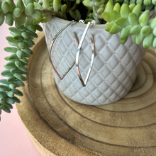 Load image into Gallery viewer, Sihouette Leaf outline hoop stud earrings handmade in sterling silver by Jen Lithgo Jewellery Designer