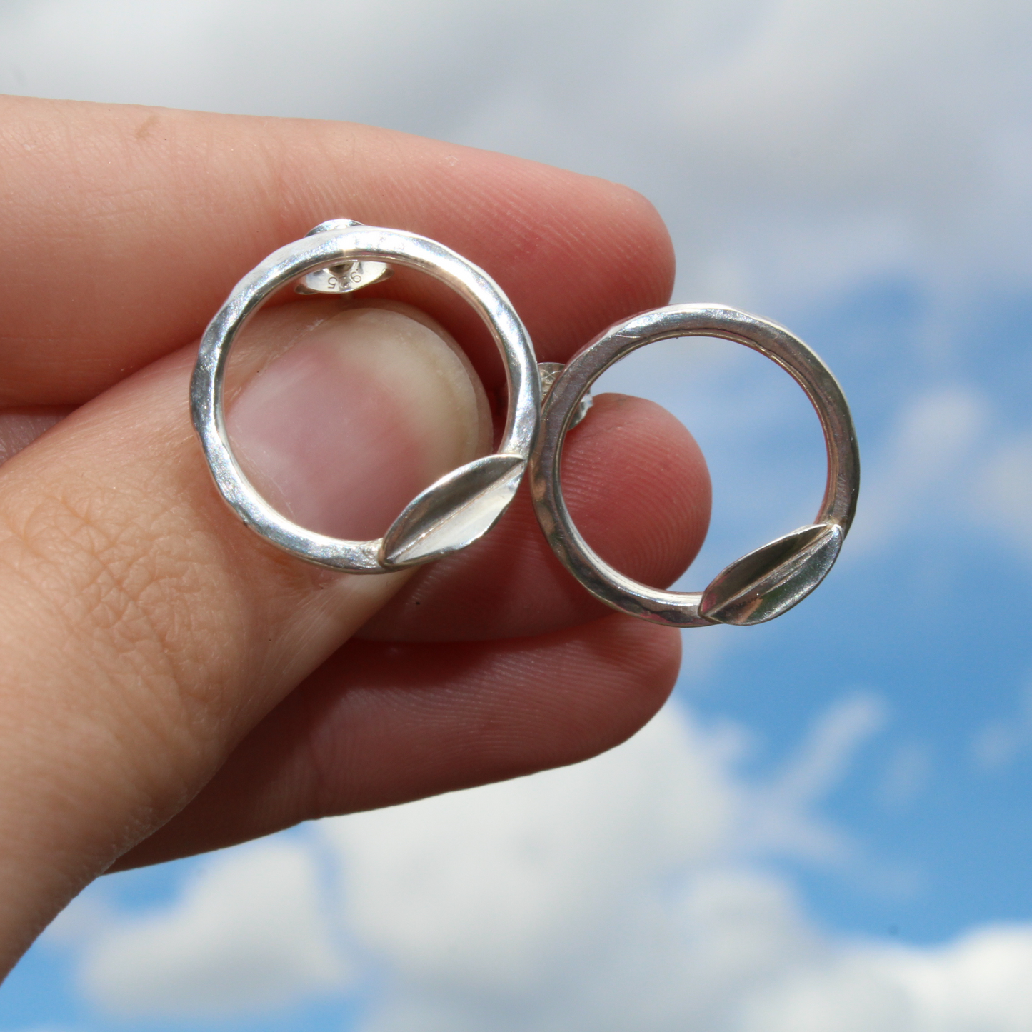 Hammered Circle stud earrings with folded leaves, handmade in sterling silver by Jen Lithgo Jewellery