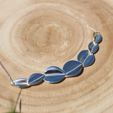 Load image into Gallery viewer, Bridesmaid 7 leaf silver necklace on wooden background
