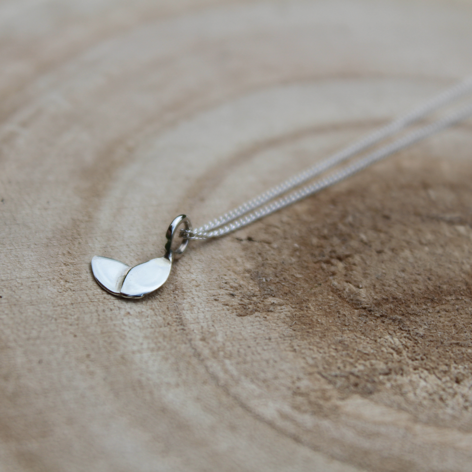 plain small duo leaf necklace on wood